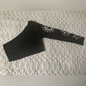 #2 Black silky one-shoulder crop w/celestial graphics on arm